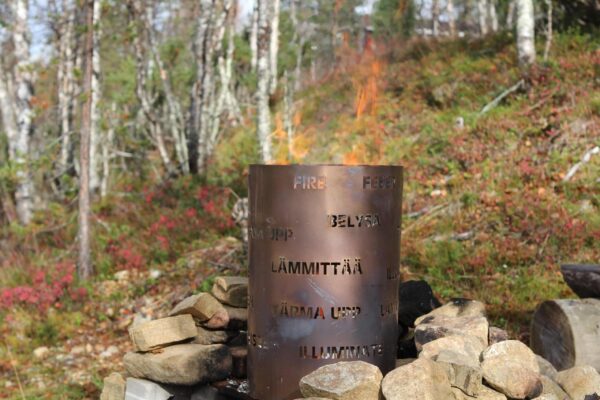 Tulisija ja nuotiokehys Nuotio lämmittää FE